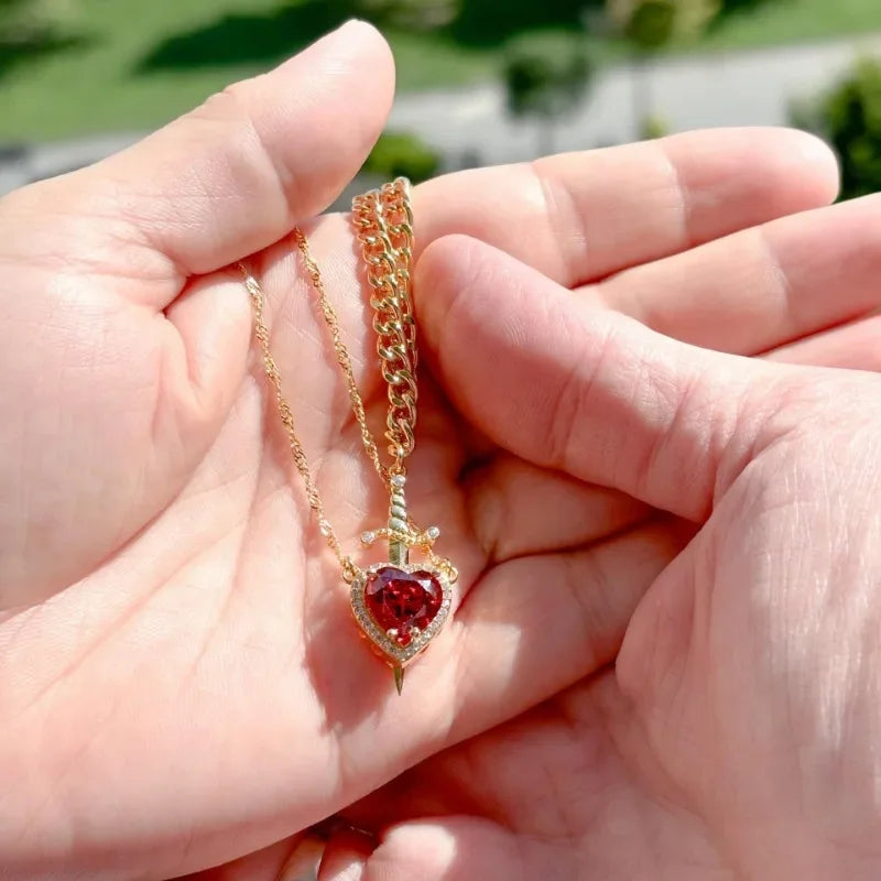 Heart and sword couple necklace set in 18K gold plating, featuring matching jewelry for couples, by achandvee.